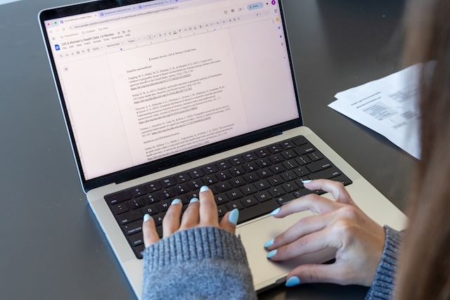A student working on laptop